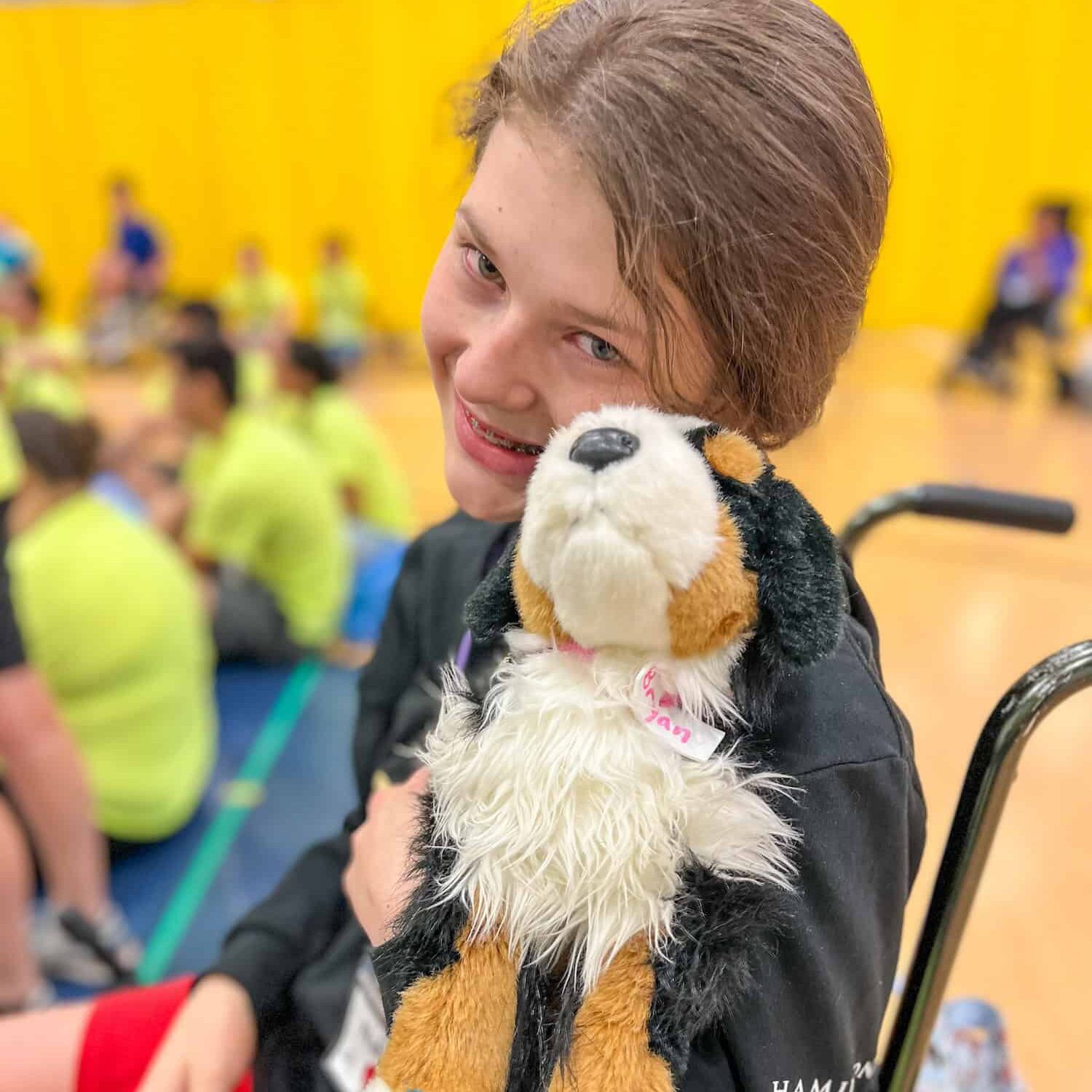 Carrie Tingley Hospital Foundation patient hugging stuffed toy.jpg